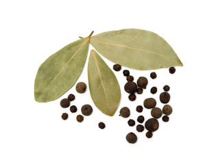 Bay leaf, allspice and pepper isolated on white background