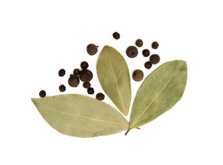 Bay leaf, allspice and pepper isolated on white background