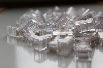 a bunch of rj-45 8P8C internet connectors on a white background