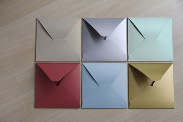Multi-colored envelopes on the light table