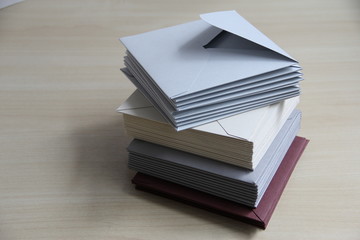 Stack of colored envelopes on the table