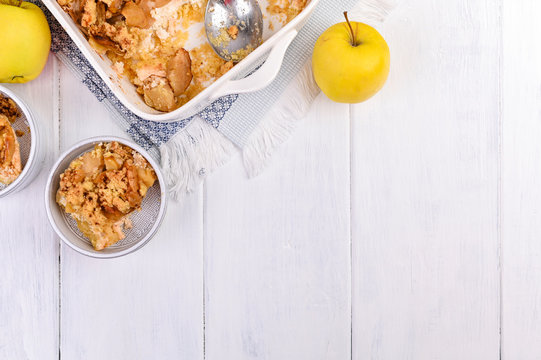 Apple Pie In White Ceramic Baking Dish. Homemade Breakfast With Apples. Bright Photo. Free Space For Text. Flat Lay