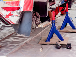 Repair and adjustment of the undercarriage of the car.