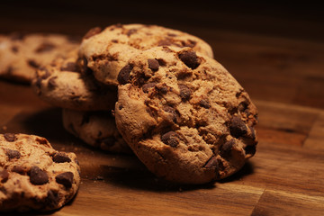 Chocolate cookies on wooden table. Chocolate chip cookies