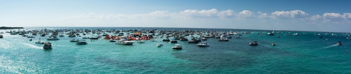 Panoramic View of the  Crab Island Park in a Sunny Day with Several Small Boats in the Sea
