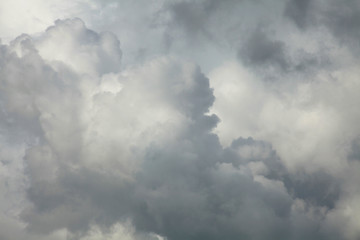 Obraz premium The background of thunderclouds. Stormy, gray, lead sky before the rain and rainstorm