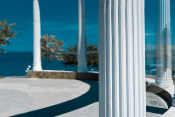 white columns by the sea