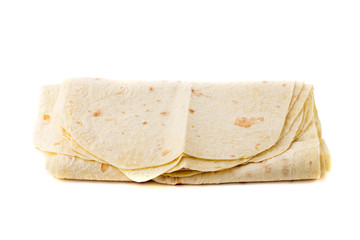 Thin pita bread on a white background. Armenian pita bread close-up.