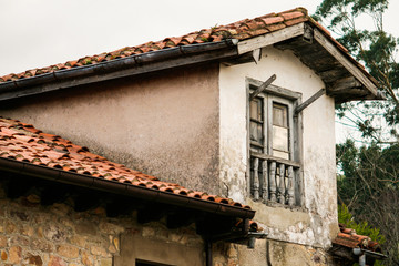 Fototapeta na wymiar roofs of old houses