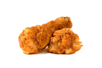 Fried legs on a white background. Chicken legs deep fried close-up.