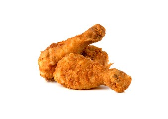 Fried legs on a white background. Chicken legs deep fried close-up.