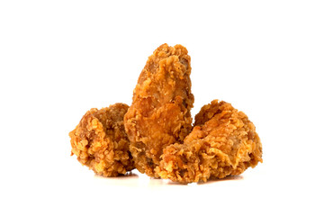 Fried wings on a white background. Deep-fried chicken wings close-up.
