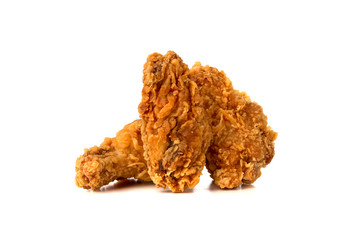 Fried wings on a white background. Deep-fried chicken wings close-up.