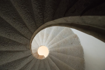Padula, Salerno, Campania, Italy - April 21, 2019: Detail of the helical stone staircase leading to the library of the Certosa di San Lorenzo