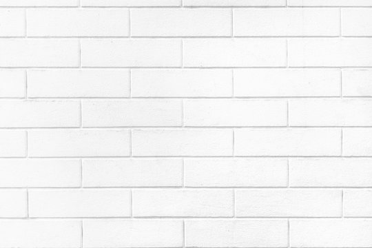 Fototapeta White brick wall texture or pale soft color brick wall as background.