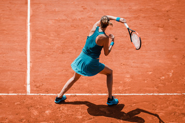 Forehand swing of woman playing tennis