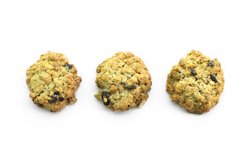 oatmeal cookies with nuts and cranberries on white isolated background