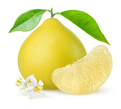 Isolated pomelo citrus fruit. One whole pomelo and a peeled segment with leaves and flowers isolated on white background with clipping path
