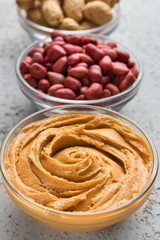 Peanuts and peanut butter in bowls