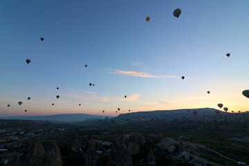 Hot air balloons over Goreme, Turkey, before sunrise.