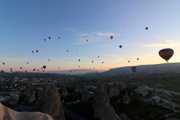 Hot air balloons over Goreme, Turkey, before sunrise.