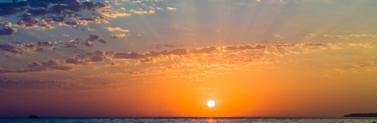 Amazing sea sunset, the sun, waves, clouds