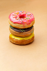 a stack of different donuts