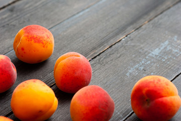 peaches on black wood table