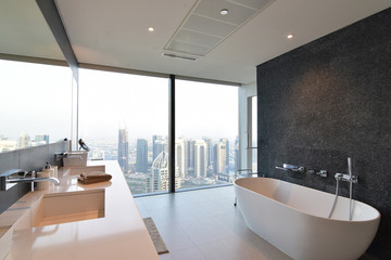 Stylish Bathroom of a High Rise Apartment in Dubai Overlooking Cityscape