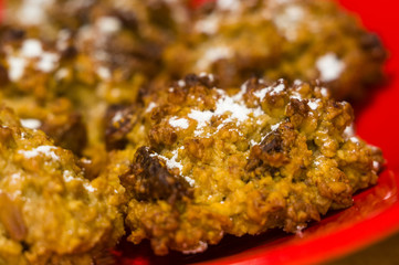 homemade oatmeal cookies with coconut, dates and powdered sugar