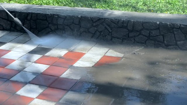 Street cleaning pressure water