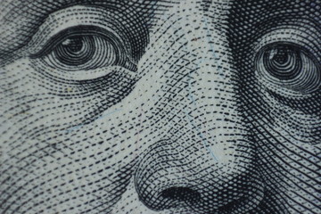 Enigmatic Macro Gaze: The Eyes of Benjamin Franklin on the $100 Bill. Benjamin Franklin's...