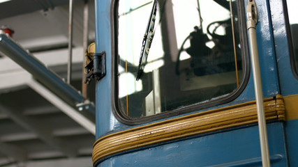 Retro railway carriage close up. Close up window of old subway car. Scrap metal. Disposal of old vehicles.