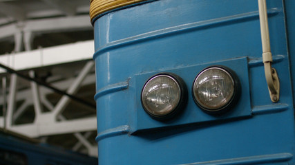 Part of subway train close up. Close up headlights of the underground carriage at the subway station.