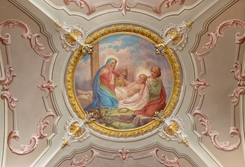 MENAGGIO, ITALY - MAY 8, 2015: The neobaroque fresco of Deposition of the cross (Pieta) in church chiesa di Santo Stefano by Luigi Tagliaferri (1841-1927).