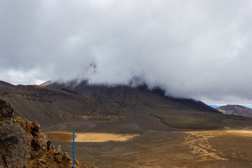 Mount Ngauruhoe covered behind clouds in the Tongariro National Park, New Zealand