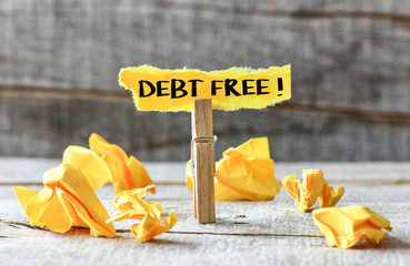 Debt free ! Paper sticker with debt free inscription. Business concept.