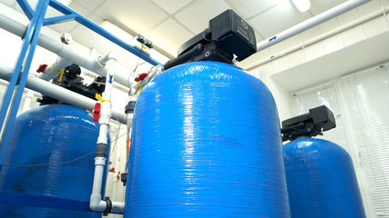 Water filters at the plant. Tanks and pipes. Renewed equipment at factory. Modern technologies of...