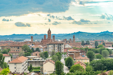Fototapeta na wymiar The town of Alba and its cathedral, Piemonte, Italy. It is considered the capital of the UNESCO Human Heritage hilly area of Langhe, and is famous for its white truffle, peach and wine production