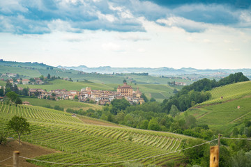 Fototapeta na wymiar View of Barolo town (Piedmont, Italy) panorama, the medieval castle and the vineyards. Barolo is the main village of the Langhe wine region.