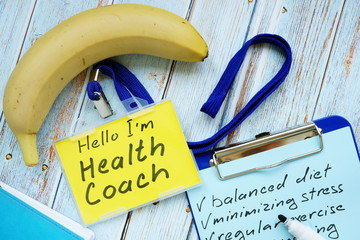 Health coach badge and check list with clipboard.