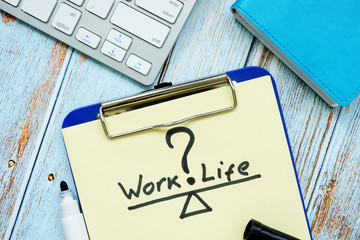 Work life balance concept written on a clipboard.