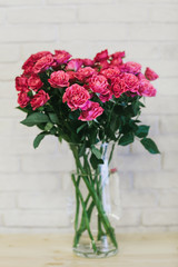 A bouquet of large pink roses close up