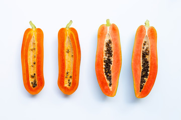 Papaya fruit on white.