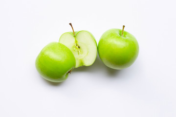 Green apples on white