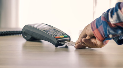 Debit card swiping on card reader device