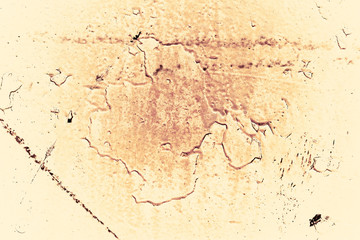 Vintage yellow background. Rough painted wall of aspen gold color. Imperfect plane of golden colored. Uneven old decorative toned backdrop of yellow tint. Texture of gold hue. Ornamental stony surface