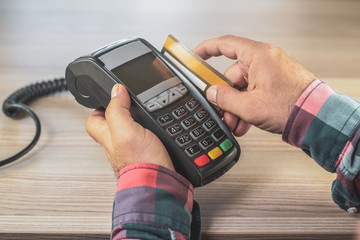 Debit card swiping on card reader device