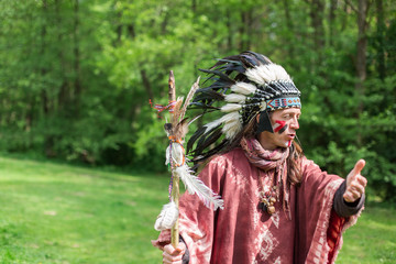 Native american indian, tribal leader in traditional indian clothes. Indian culture and history concept