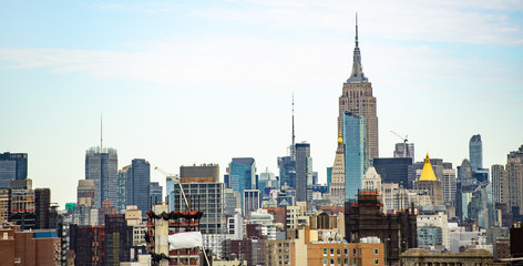 (Selective focus) Stunning view of the Manhattan skyline seen from the Brooklyn bridge. Manhattan, New York City, USA.